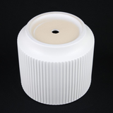 Bottom of 3-Piece White Stoneware Planter Pot Set with Ribbed Texture with ribbed texture on a black background