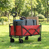 Red wagon with items on grassy area