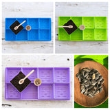 Collage of seedling trays in blue, green, and purple with seeds and tools on a wooden surface.