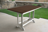 Outdoor table with brown top and white base on a patio