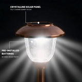 Solar lamp with labeled crystalline solar panel and pre-installed batteries on a dark background