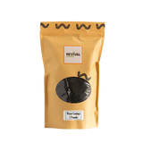 Yellow package of worm castings with 'Revival' branding on a white background