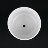 3-Piece White Stoneware Planter Pot Set with Soft Vertical Texture on a black background