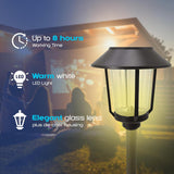 Solar lamp with features highlighted on a blurred background of people sitting outdoors.