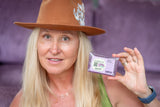 Woman holding a bar of HEMP OIL SOAP 5 oz. ~ LAVENDER MINT