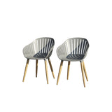 Two gray chairs with wooden legs on a white background