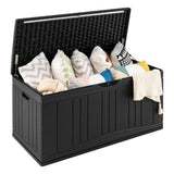 Black storage box filled with various items on a white background