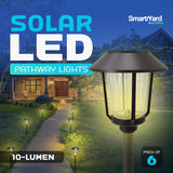 Solar LED pathway lights with SmartYard branding in front of a house.