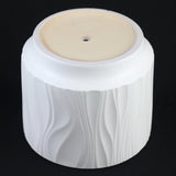 White Stoneware Planter Pot with Embossed Textureon a black background