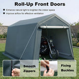 A dark gray roll-up front door carport/shed shown outdoors on grass with a motorcycle parked inside. The image includes marketing text at the top and two inset close-up feature panels at the bottom showing smooth zippers and fixing buckles.