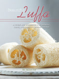 Book cover of 'Beautiful Luffa' with loofah sponges on a wooden surface.