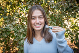 Woman holding VANILLA SWIRL LUXURY LIP BUTTER™ - THE APPALACHIAN GOAT