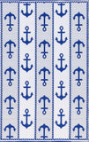 Patterned fabric with blue anchors on a white background