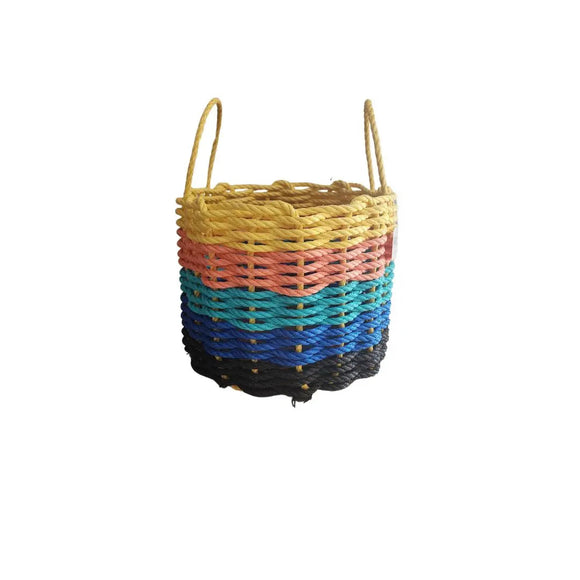 Multicolored woven basket with handles on a white background