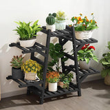 Indoor Outdoor Black Bamboo Wood 6-Shelf Flower Pot Plant Stand with various potted plants on a wooden floor.