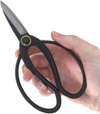 Hand holding a pair of Bonsai Pruning Shears Scissors 180mm on a white background