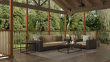 Outdoor patio with furniture and a view of trees