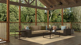 Outdoor patio with furniture, Basic Cream & Brown rug, and a view of trees