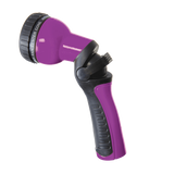 Purple and black garden hose nozzle on a white background