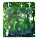 Pest Wizard Big Invisible Insect Trap 5-Pack hanging against a green leafy background
