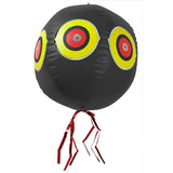 Black balloon with target designs and red tassels on a white background