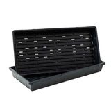 Black plastic tray with multiple compartments on a white background