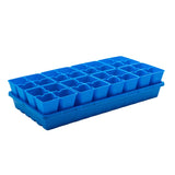 Blue plastic seedling tray with multiple compartments on a white background