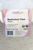 Package of Country Life Organic Buckwheat Flour on a light background