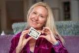 Woman holding ALMOND MILK SOAP 5 oz. ~ INFUSED WITH ARNICA