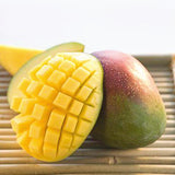Sliced mango on a woven mat