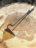 A close-up of a Classic Hoe Hand Forged Garden Tool