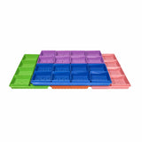 Set of colorful plastic trays on a white background