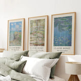 Three framed artworks by Claude Monet on a wall above a bed.