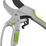 Gardening shears with green handles on a white background