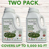 Two bottles of Flawn Seed Kits Dutch White Clover Seed Kit on a wooden background
