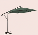 Green patio umbrella with a stand on a beige background
