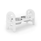 White pet bowl stand with two stainless steel bowls on a white background