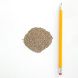 MontanaGrow Organic Granular Silicon (25 lb) next to a yellow pencil on a white background