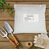 Bag of Microna Limestone on a wooden surface with gardening tools and gloves.