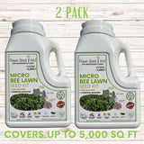Two bottles of Flawn Seed Kits Micro Bee Lawn Seed Kit on a wooden surface.