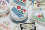 Collection of soap and cream products with branding on a white background
