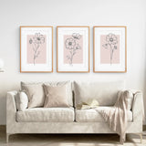 Beige sofa with Pink Wall Art Set Of 3 Botanical Modern Decor in a living room setting