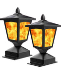 Two black outdoor lamps with flame-like design on a white background
