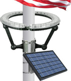 Solar-powered flagpole light with American flag in the background