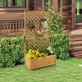 Wooden planter with lattice design and plants against a wooden house background