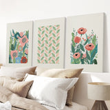 Botanical Pink Poppies Wall Art Poster Decor on a white wall above a bed with pillows and a lamp.