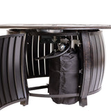 Close-up of a metal barrel-style fire pit with a black bag inside on a white background