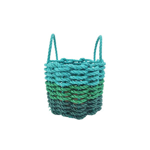 Teal rope basket on a white background