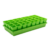 Green plastic seedling tray on a white background 4 Cell Plug Tray Inserts