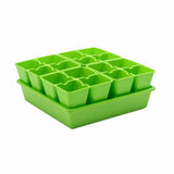 Green seedling tray with multiple compartments on a white background